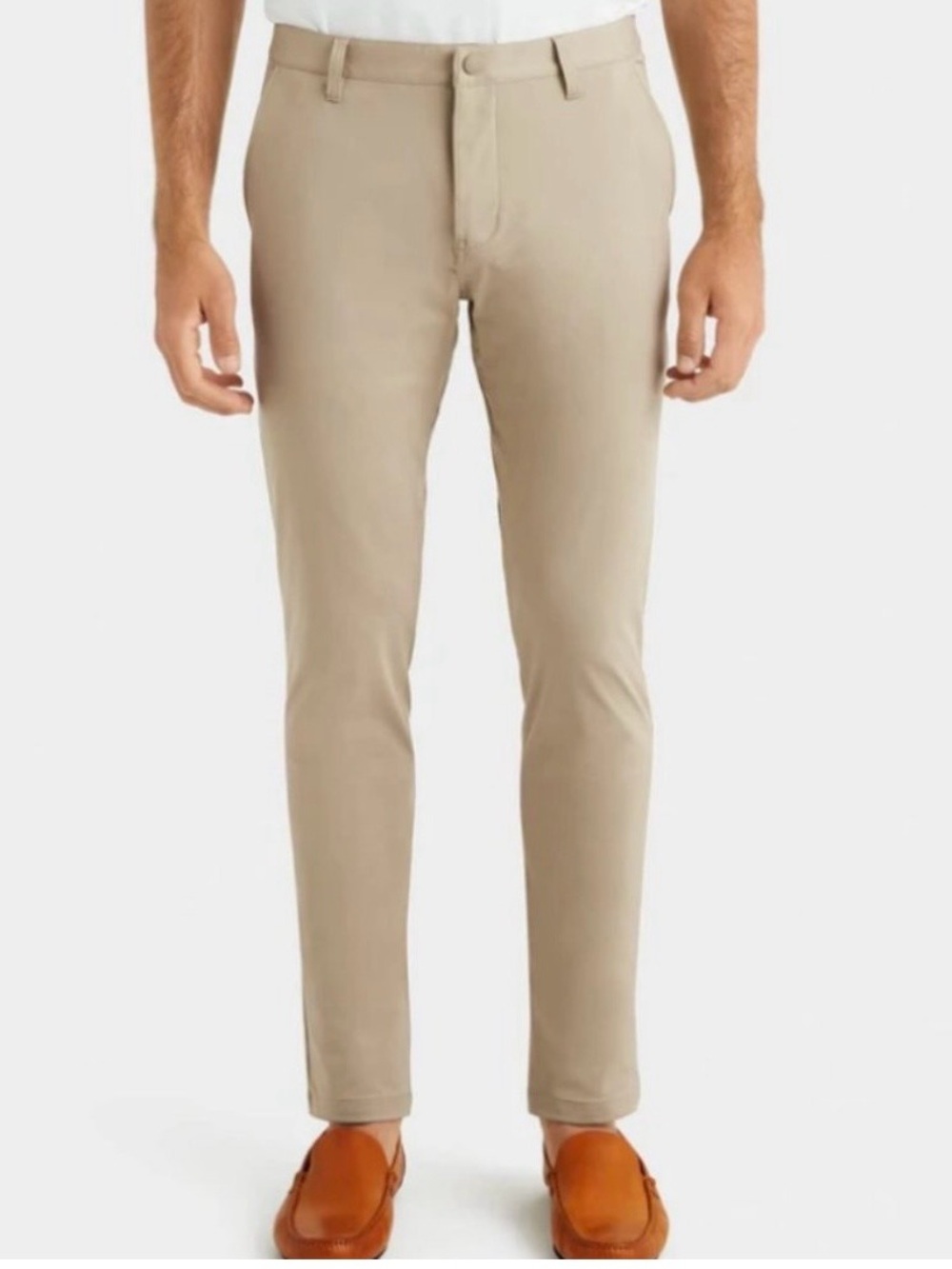 Rhone Slim Commuter Pants in tan. Size 34